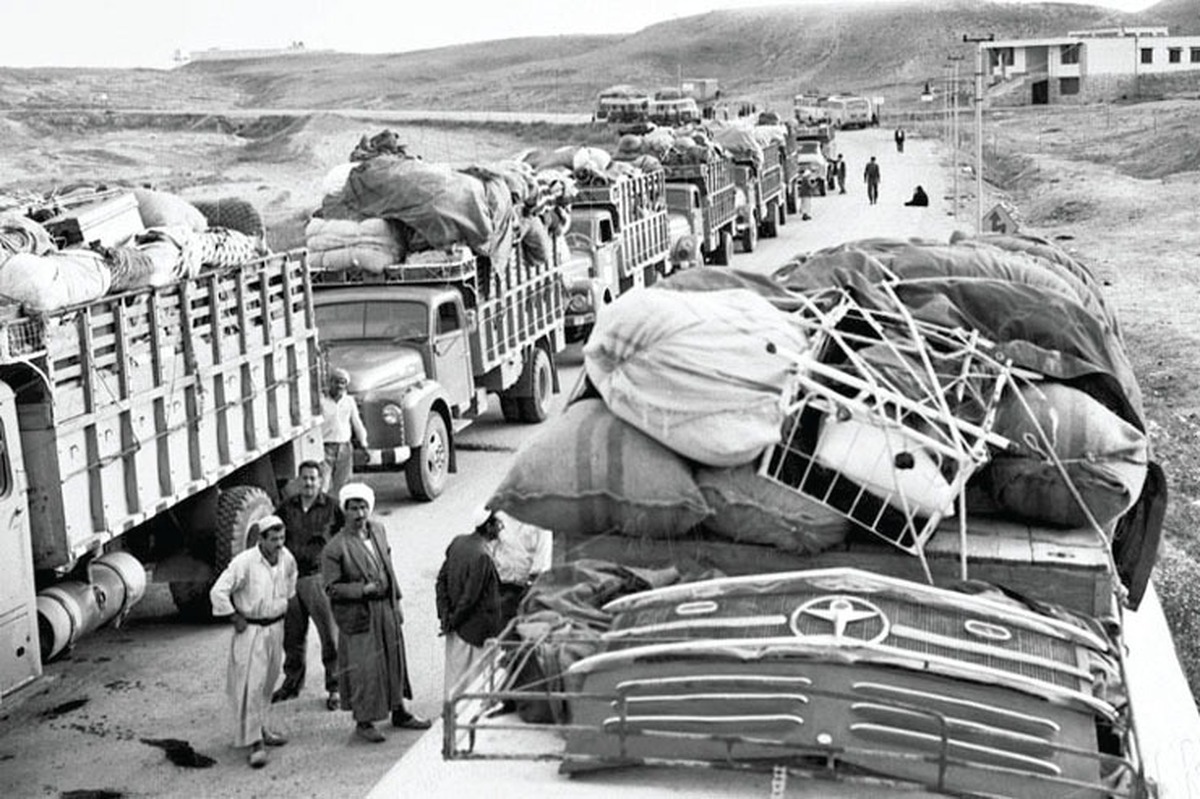 تاریخ از جمعیت مهاجری با عنوان معاودین (بازگشتگان) نام می‌برد که از عراق آمده‌اند، ولی ریشه‌ای ایرانی دارند. معاودین در واقع جمعیتی ایرانی هستند که در یک برهه تاریخی بنا به شرایط سیاسی و اجتماعیِ روزگار خود، برای دهه‌ها و نسل‌ها ترک وطن گفته، اما دوباره بازمی‌گردند.