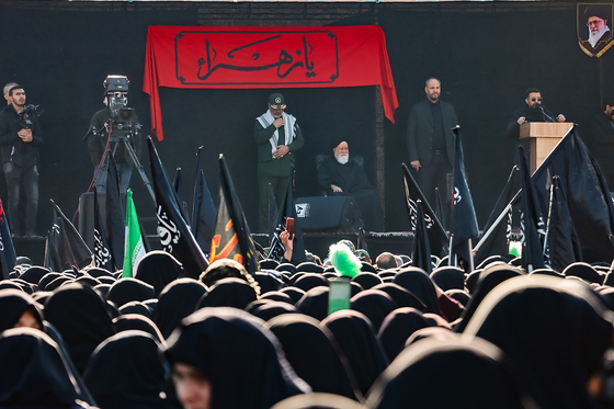 تشییع پیکر 12 شهید گمنام دفاع مقدس و 2 شهید حادثه تروریستی راسک در مشهد