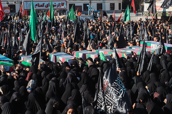 تشییع پیکر 12 شهید گمنام دفاع مقدس و 2 شهید حادثه تروریستی راسک در مشهد