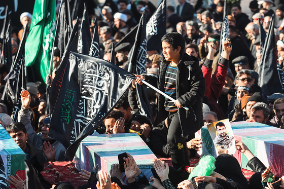تشییع پیکر 12 شهید گمنام دفاع مقدس و 2 شهید حادثه تروریستی راسک در مشهد