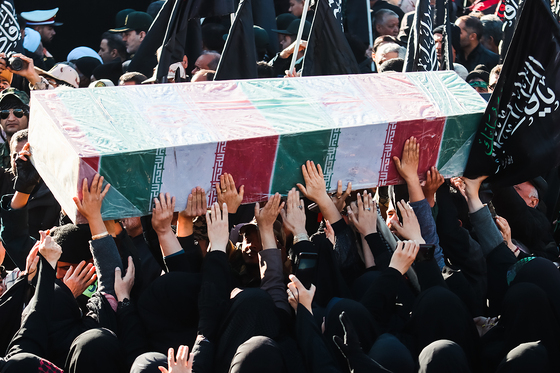 تشییع پیکر 12 شهید گمنام دفاع مقدس و 2 شهید حادثه تروریستی راسک در مشهد
