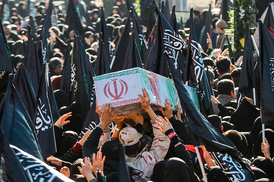 تشییع پیکر 12 شهید گمنام دفاع مقدس و 2 شهید حادثه تروریستی راسک در مشهد