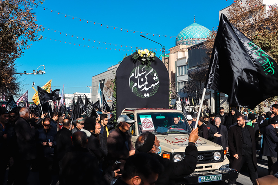 تشییع پیکر 12 شهید گمنام دفاع مقدس و 2 شهید حادثه تروریستی راسک در مشهد