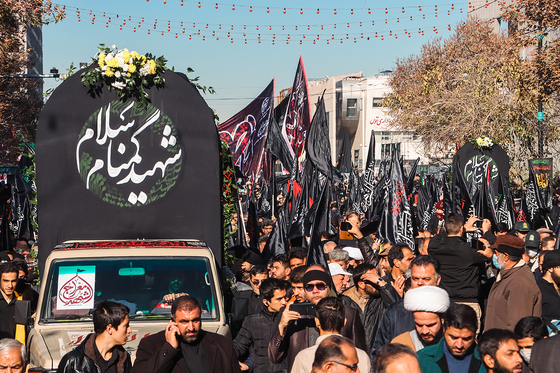 تشییع پیکر 12 شهید گمنام دفاع مقدس و 2 شهید حادثه تروریستی راسک در مشهد