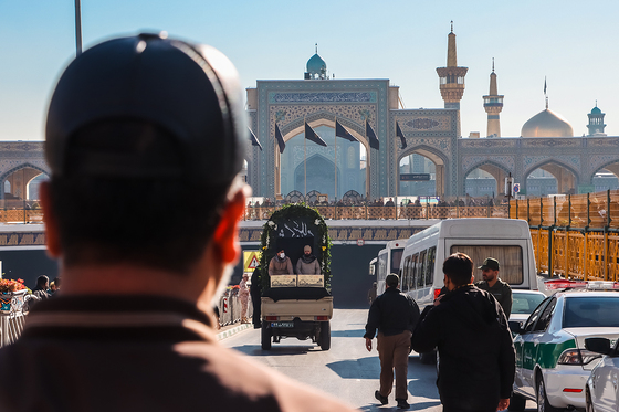 تشییع پیکر 12 شهید گمنام دفاع مقدس و 2 شهید حادثه تروریستی راسک در مشهد